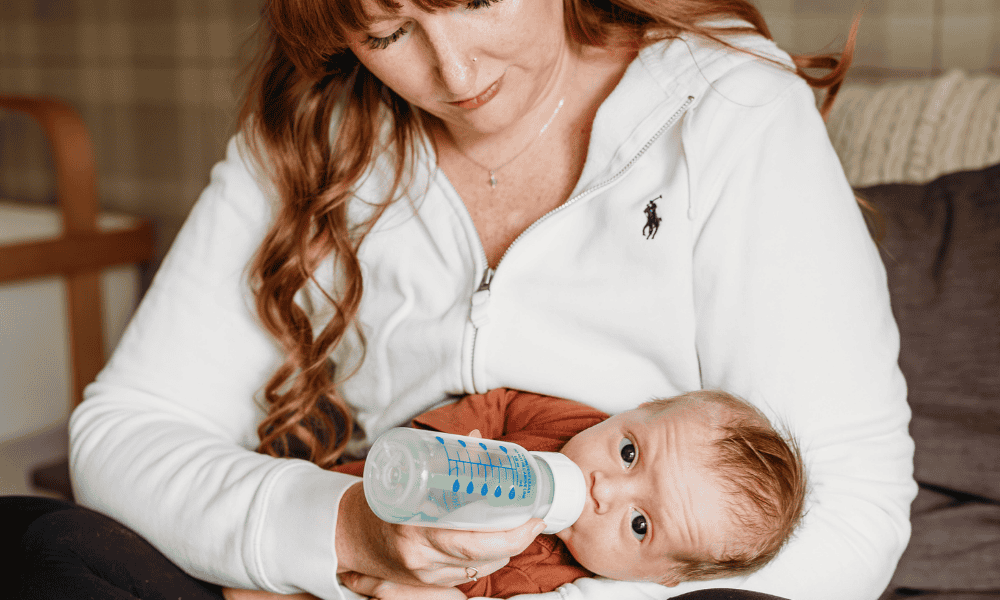 newborn care specialist side-lying feeding newborn