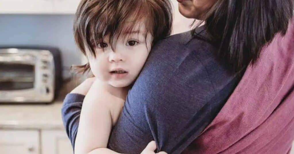 mom with baby in sling