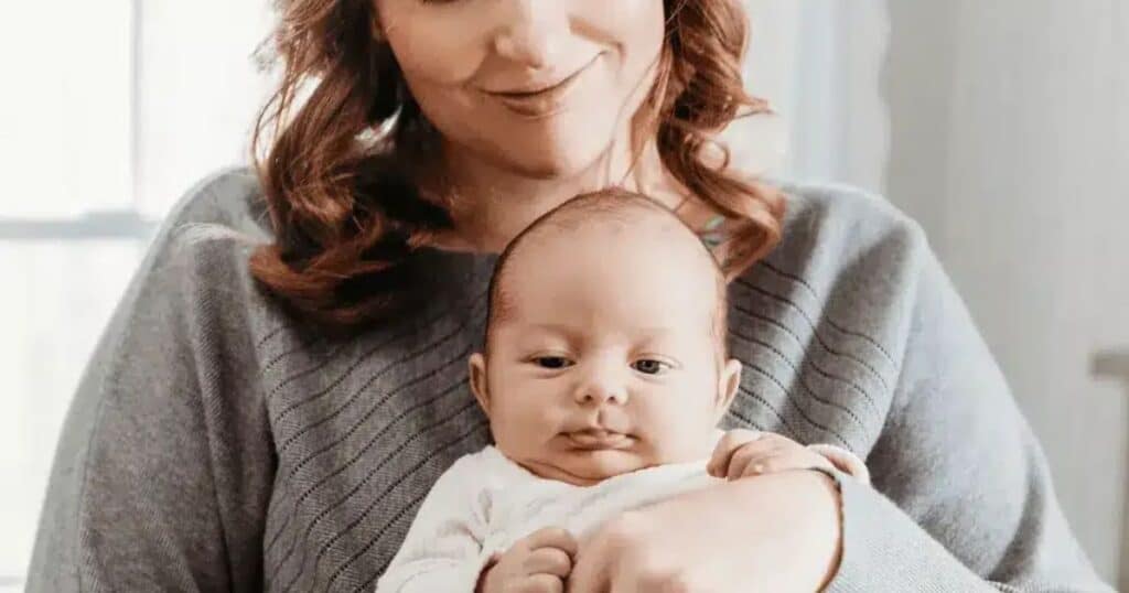 boston baby nurse holding baby