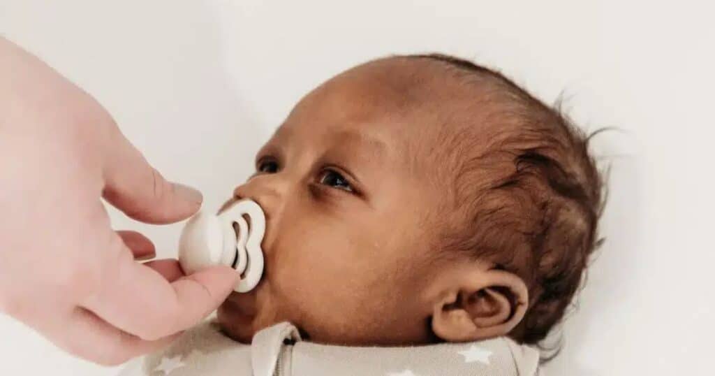baby with pacifier