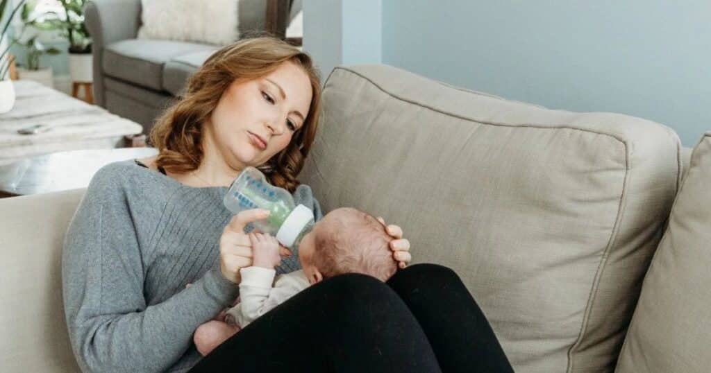 newborn care specialist bottle feeding baby