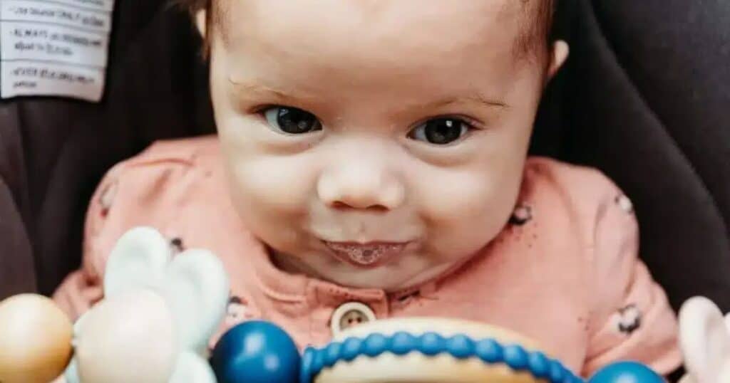 teething baby with drool