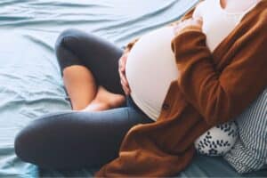 Woman with full term pregnancy.