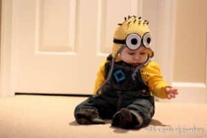 Baby in minion costume.