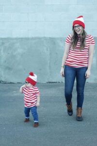 Mom and child in Waldo costumes.