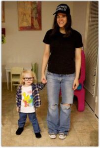 Mom and child in costumes inspired by Wayne's World.