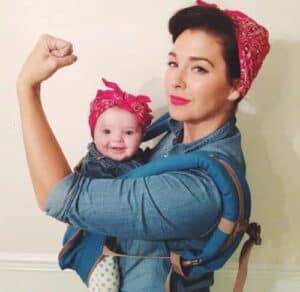 Mom and baby as Rosie the riveter costumes.