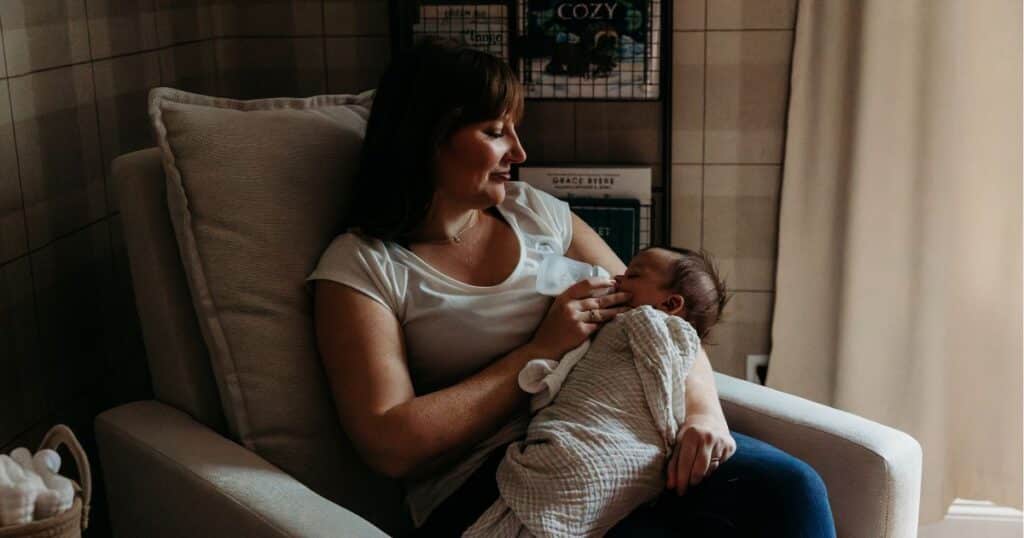 newborn care specialist feeding baby