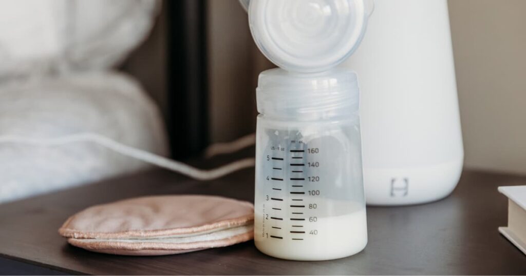 breast pump bottle with milk and ounce markers
