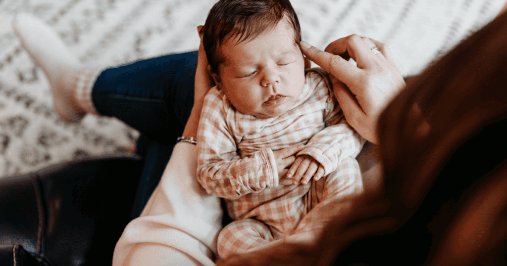 Baby sleeping while being held, baby sleeping in arms